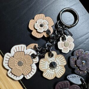 Coach tea rose mix charm